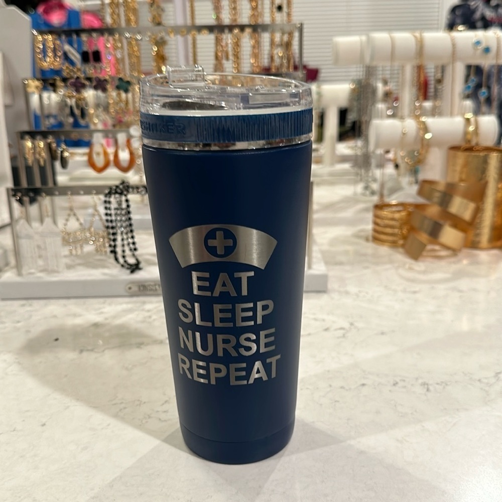 Ice Shakers nurse themed navy tumbler “eat sleep nurse repeat”.
